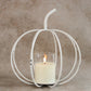 10.75"H x 10"W White Metal Cage Pumpkin, a cozy accent for fall gatherings.