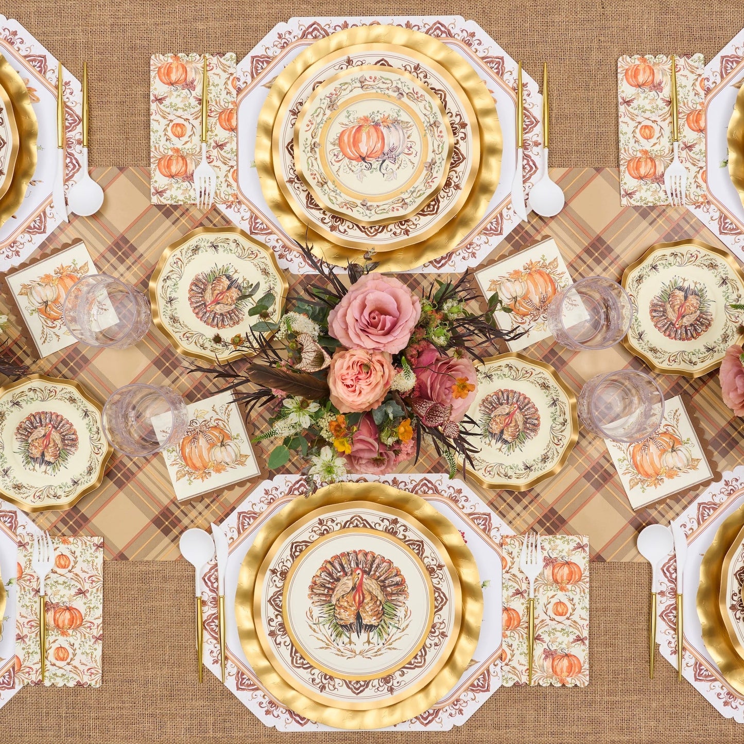 Sure! Here’s the revised sentence using your provided product data: Celebrate Thanksgiving in style with the Turkey & Gourds Table Setting by Sophistiplate, a fall-themed party-in-a-box that includes designer disposable plates adorned with turkeys and pumpkins, gold chargers, a floral centerpiece featuring pink roses, a plaid tablecloth, and matching napkins—all beautifully coordinated to create stunning Thanksgiving table decor when viewed from above.