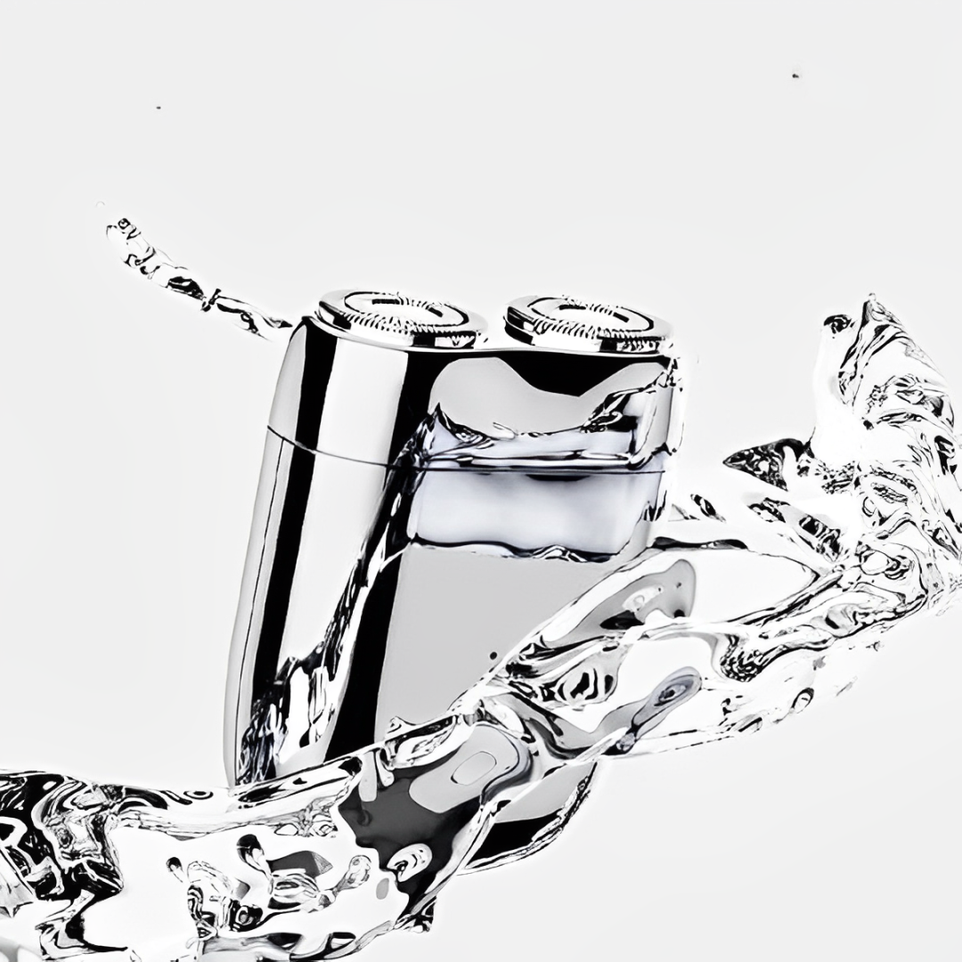 Dual Rotary Head Shaver with Wet and Dry Operation and Floating Blade System