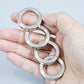Metal Finger Ring with Four Finger Grip and Spring-Back Action, Silent Operation