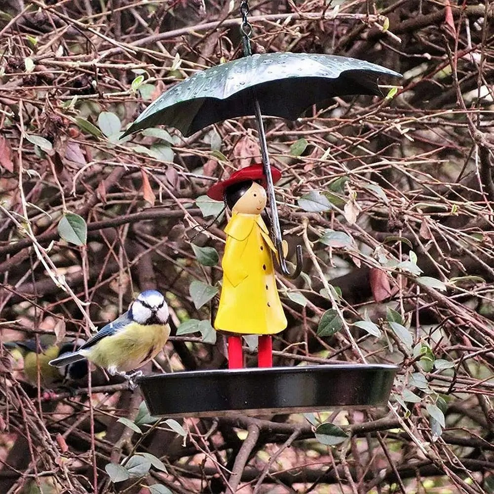 Artistic Raincoat Girl Bird Feeder - Image 1