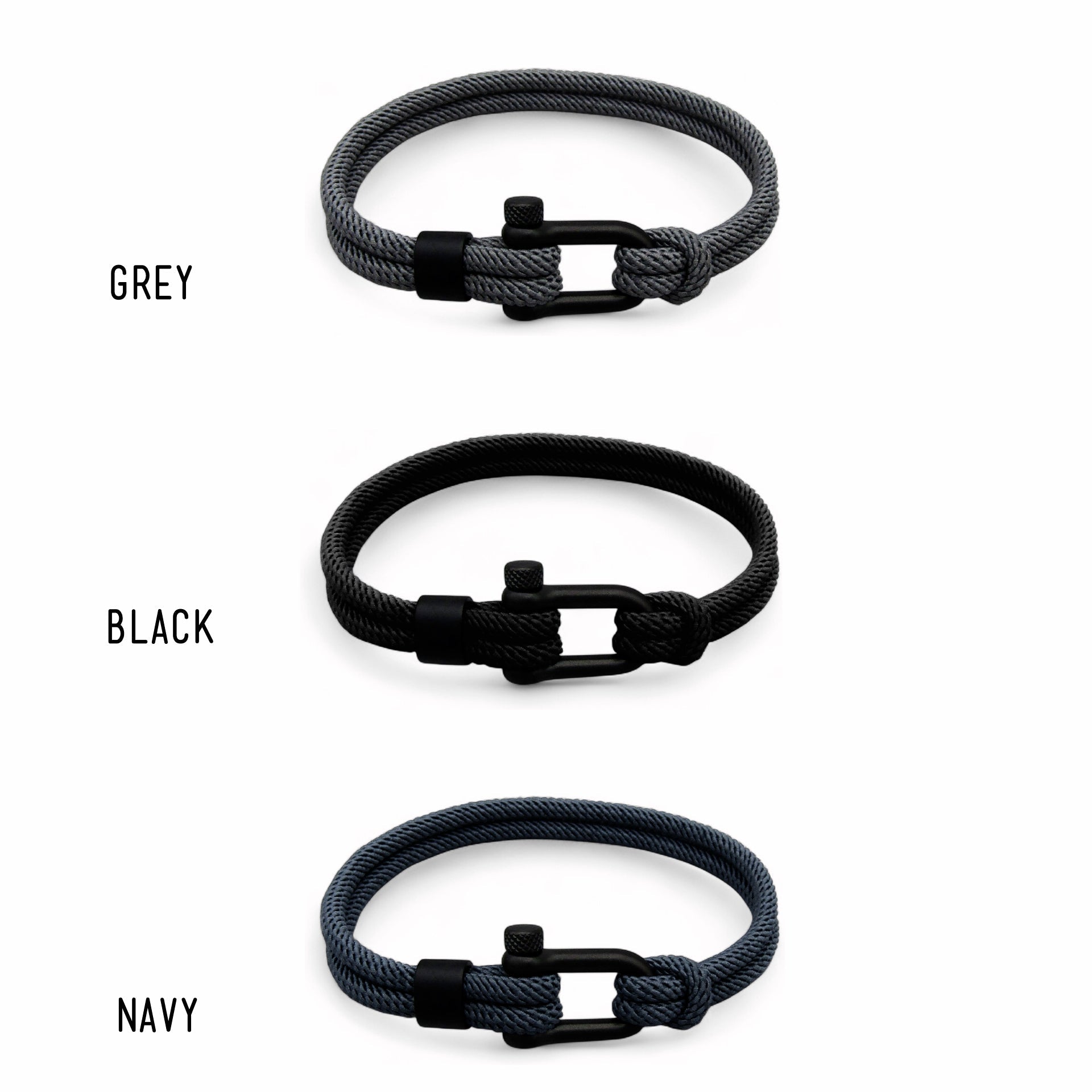 Three braided bracelets in grey, black, and navy with black clasp on a white background.