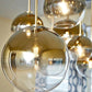 Modern Globe Pendant Light in Brushed Brass