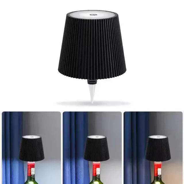 Black pleated LED Bottle Table Lamp  on a white background with three additional images showing its use on a bottle.