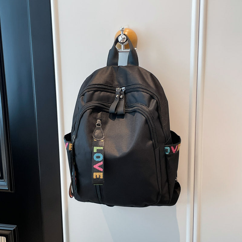 Two-Compartment Backpack with Padded Straps and Weather Resistant Fabric, Laptop Compatible