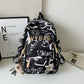 Graffiti Print Backpack with Padded Laptop Sleeve and Weather Resistant Fabric