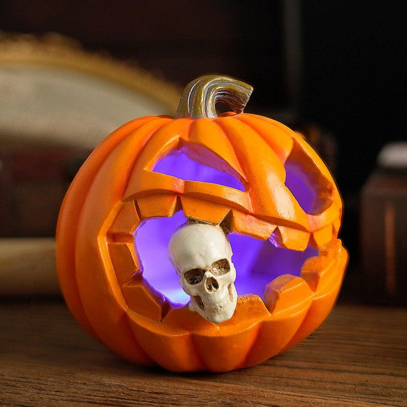 Carved Jack O'Lantern Ornament with Skull Insert and Resin Construction