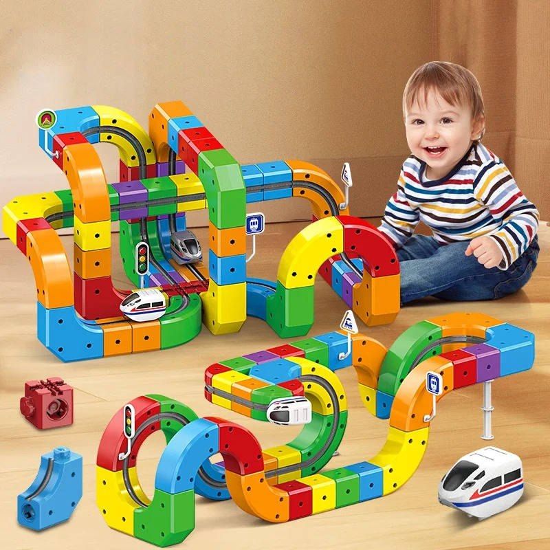 Motorized Magnetic Train Set with Flexible Track Cubes and Traffic Signs