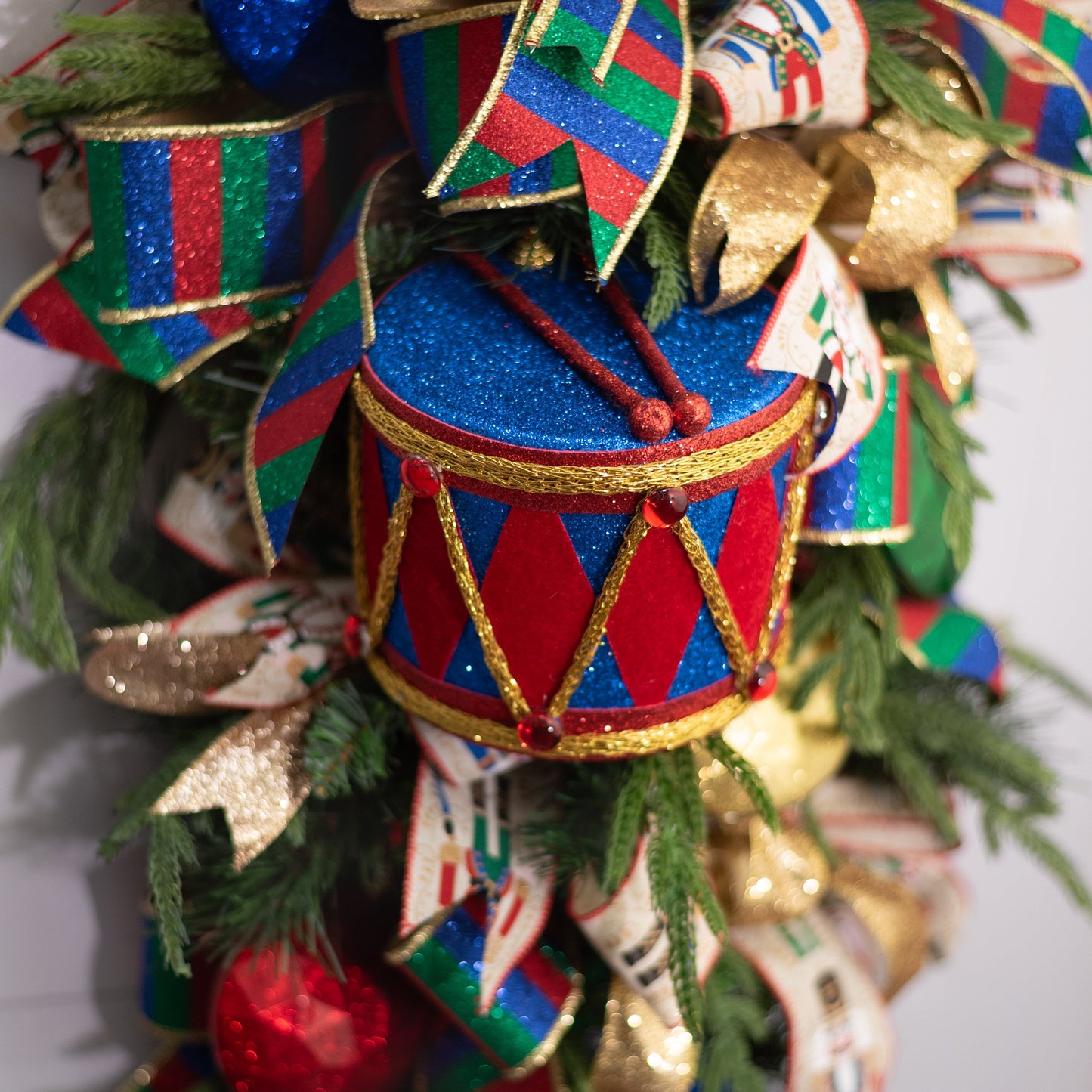 6" Glittered Harlequin Drum Ornament: Red & Blue Lifestyle Photo