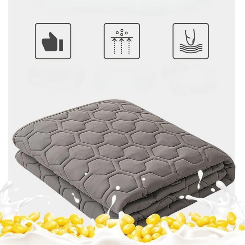 Temperature Regulating Mattress Pad with Quilted Air Channels and Grip Backing