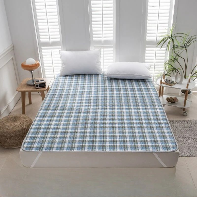 Temperature Regulating Mattress Pad with Quilted Air Channels and Grip Backing