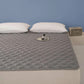 Temperature Regulating Mattress Pad with Quilted Air Channels and Grip Backing