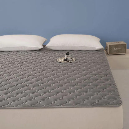 Temperature Regulating Mattress Pad with Quilted Air Channels and Grip Backing