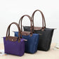 Luxury Structured Top-Handle Bag with Spacious Interior and Timeless Design