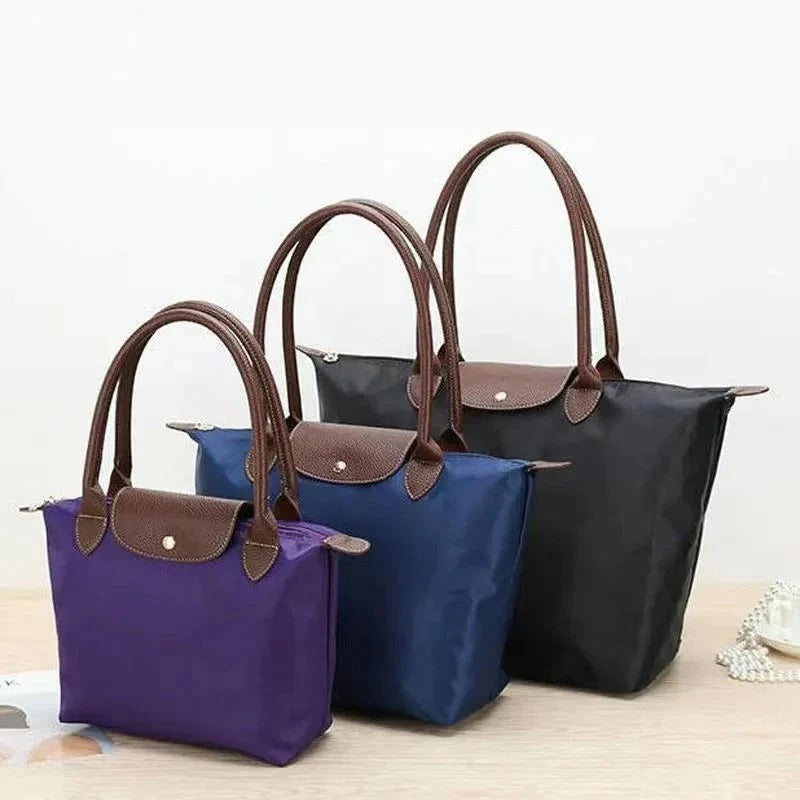 Luxury Structured Top-Handle Bag with Spacious Interior and Timeless Design
