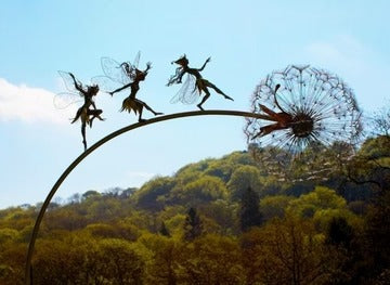 Decorative Outdoor Garden Figurine Display for Creating Whimsical Focal Points