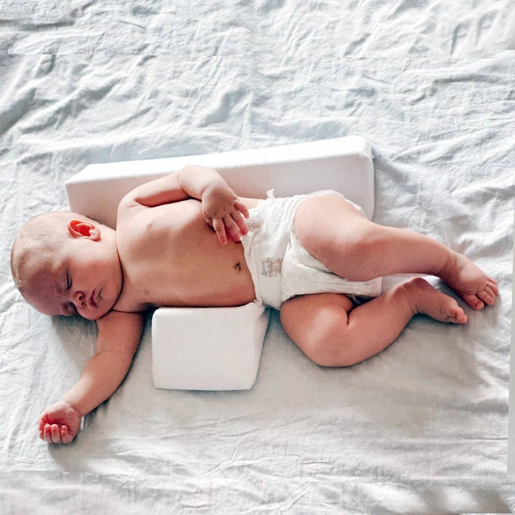 Adjustable Side Sleeping Wedge for Newborns with Dual Cushion Support and Machine Washable Cover