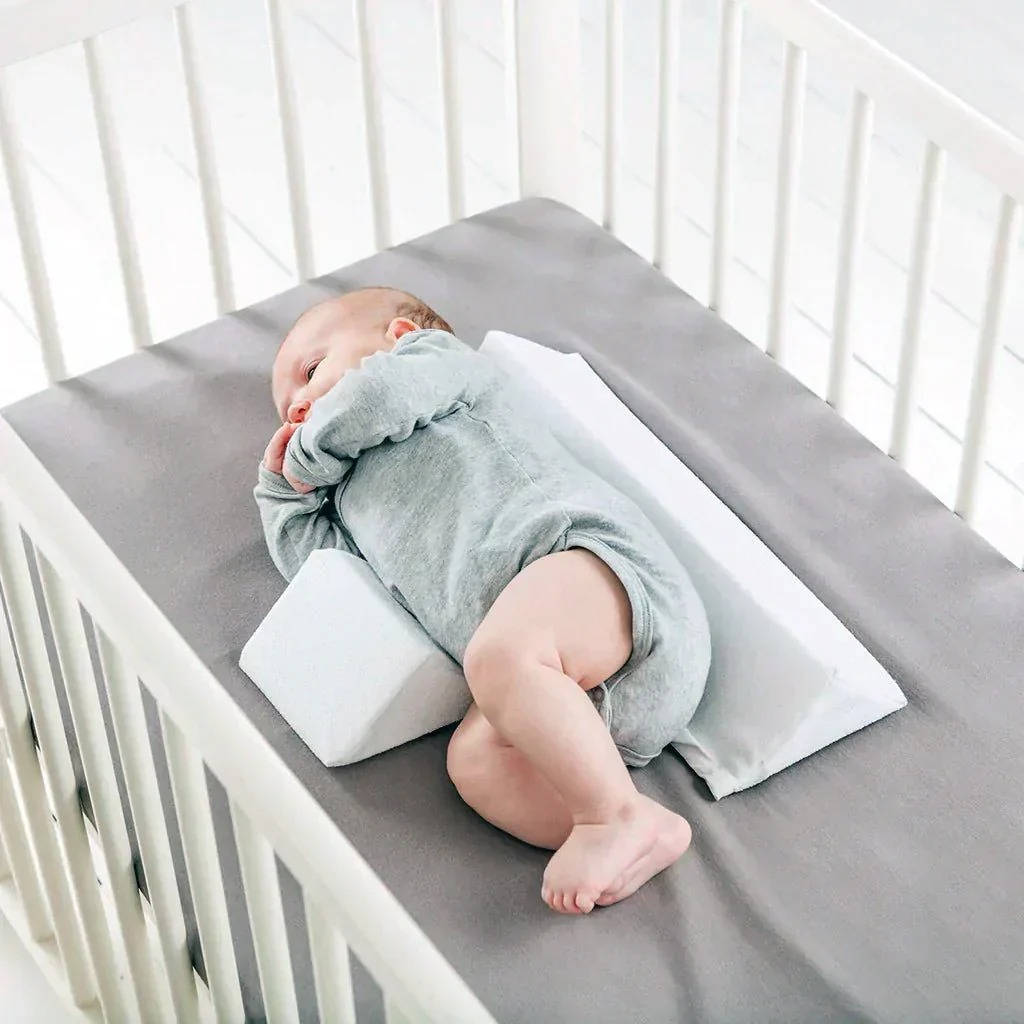 Adjustable Side Sleeping Wedge for Newborns with Dual Cushion Support and Machine Washable Cover
