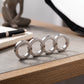 Metal Finger Ring with Four Finger Grip and Spring-Back Action, Silent Operation