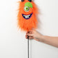 Artificial Furry Monster Eyeball Floral Spray with Orange Tinsel for Halloween Decor