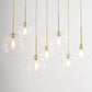Modern Globe Pendant Light in Brushed Brass