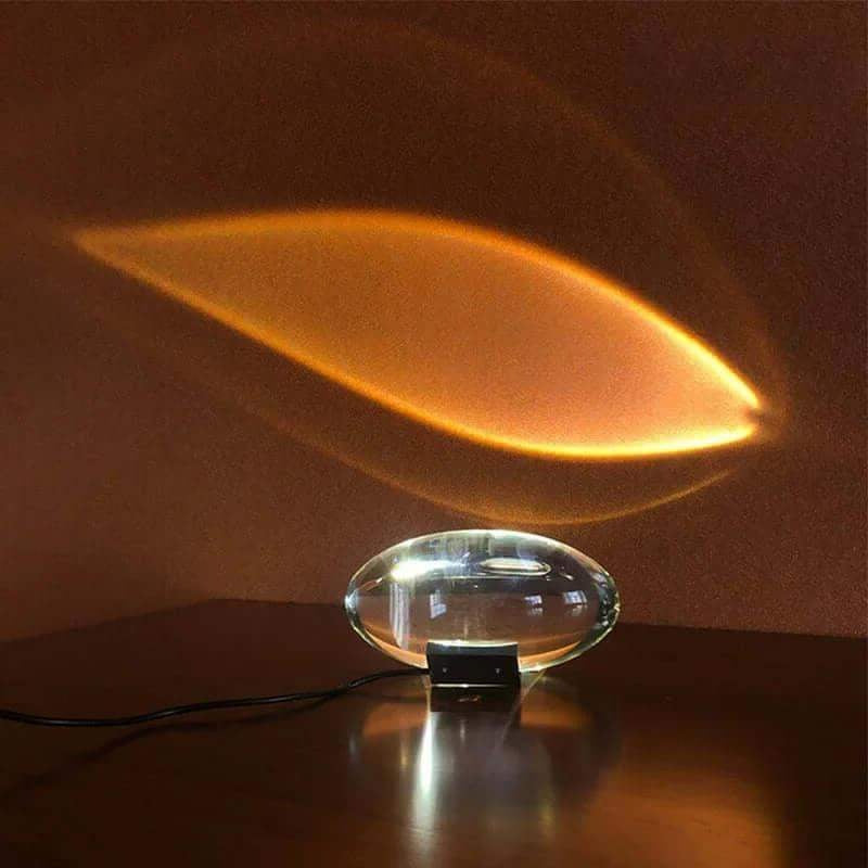 Crystal Atmosphere Lamp Elegant Ambient Lighting casting a warm glow on a dark surface