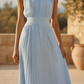 Women's elegant pleated maxi dress with a ruched waist, perfect for wedding guests & formal occasions.