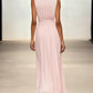 Graceful pleated wedding guest dress, maxi length, featuring a flattering ruched waist for formal elegance.