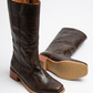 Sleek women's mid-calf boots, featuring a sturdy block heel and a fashionable closed-toe design.