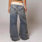 Retro Y2K women's baggy wide leg jeans with a comfortable ribbed waist, perfect for casual streetwear.